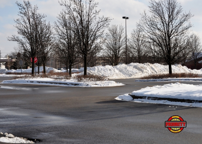 Snow Removal Done On Asphalt Parking Lot